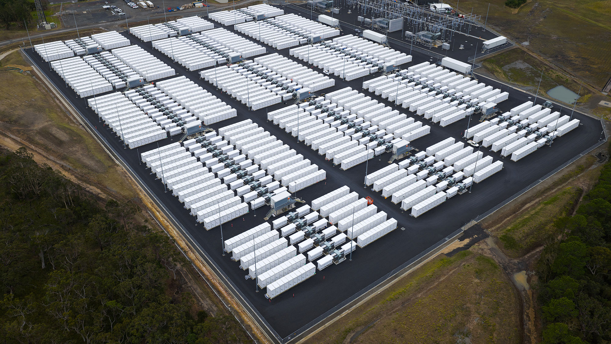 Aerial view of the Waratah BESS site with battery units and grid infrastructure.