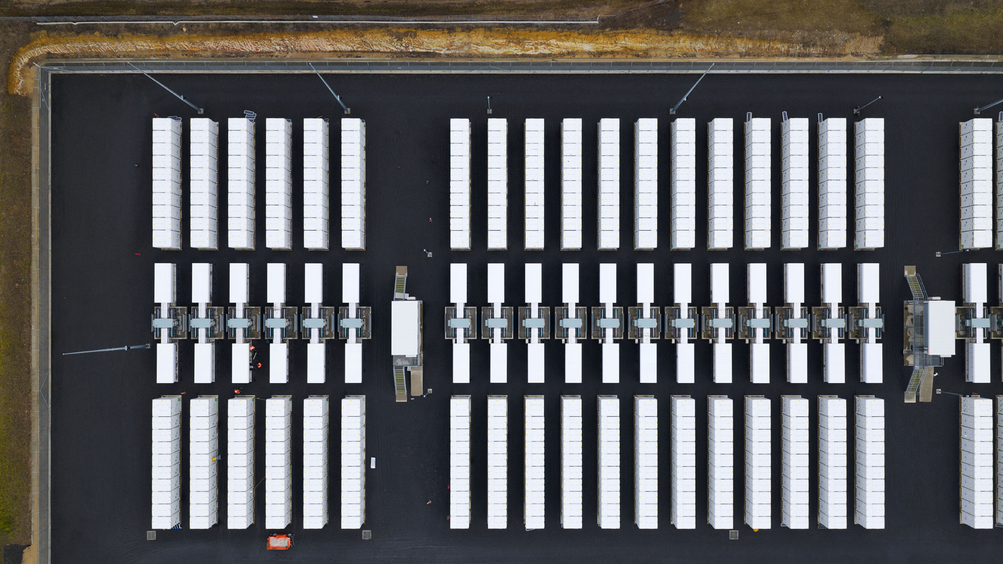 Aerial view of the Waratah BESS site with battery units and grid infrastructure.