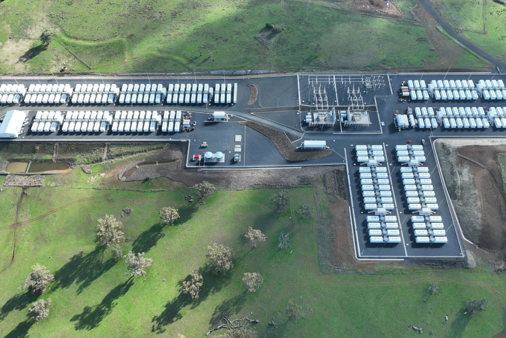 Aerial view of the Orana BESS site with battery units and grid infrastructure.