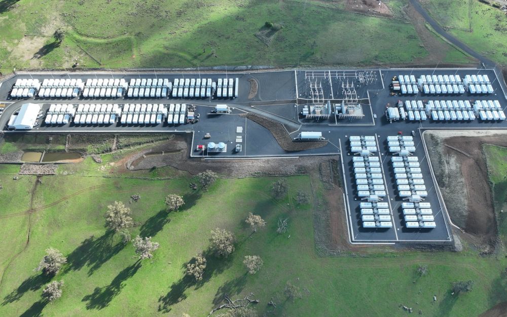 Aerial view of the Orana BESS site with battery units and grid infrastructure.